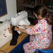 large_sewing booties at school compressed.jpg
